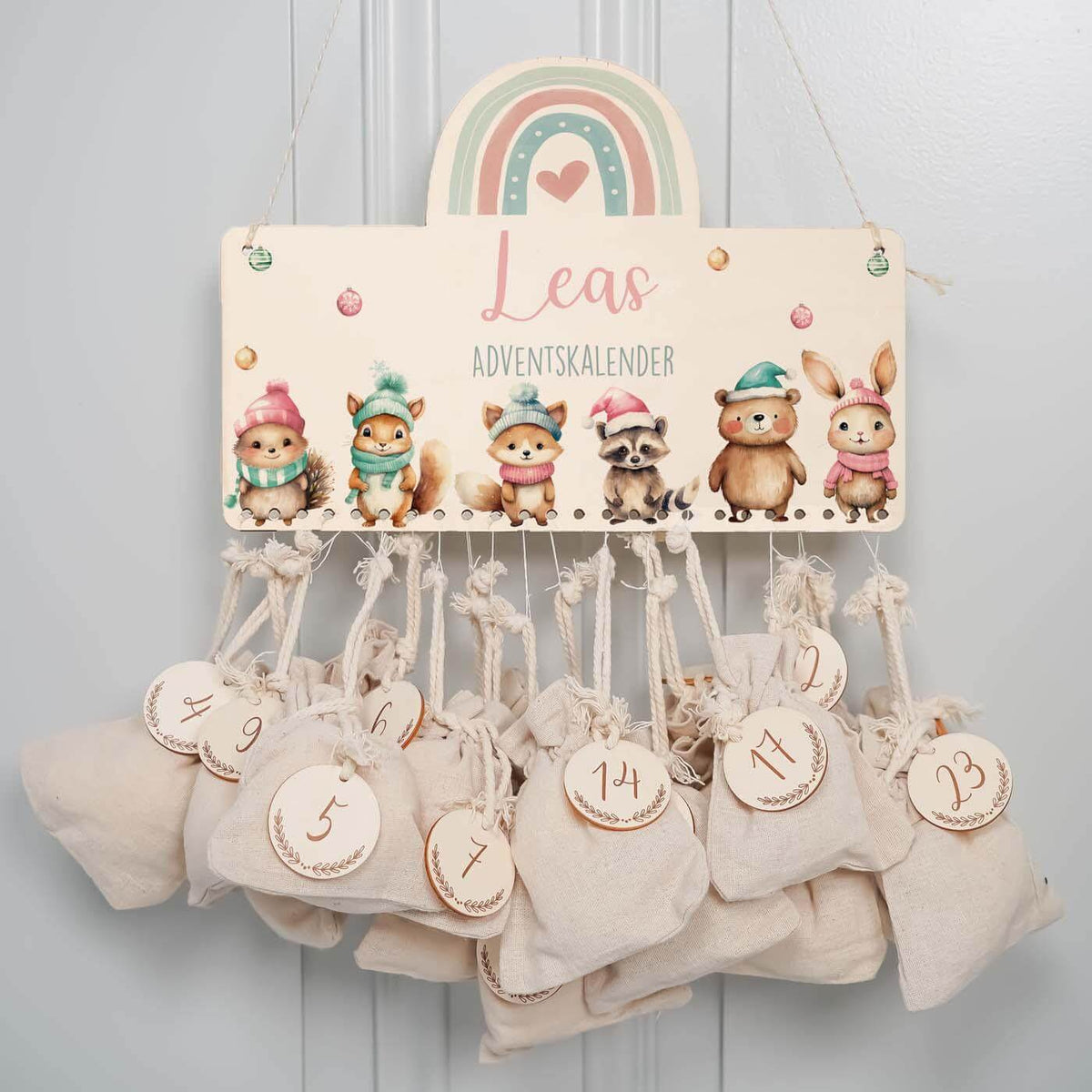 adventskalender mit winter-tierfamilie und namensgravur