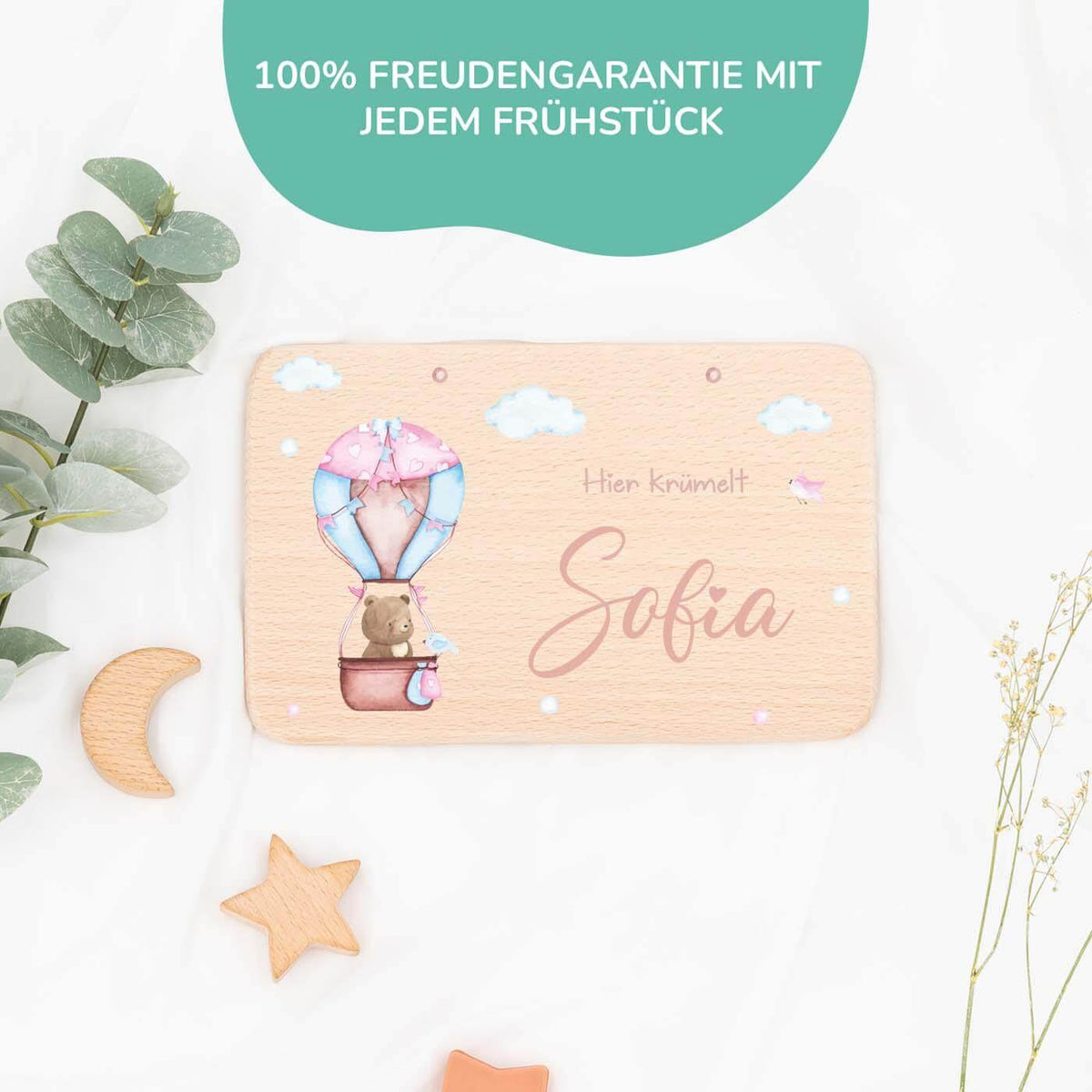 nahaufnahme des frühstücksbrettchens mit ballon-bär motiv