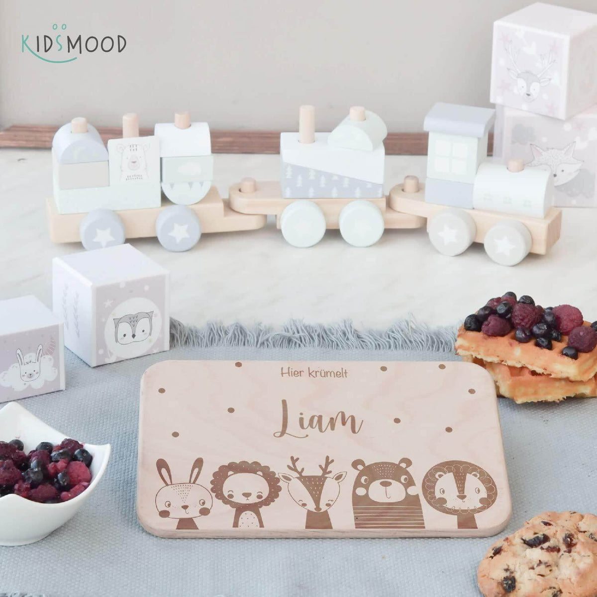 engraved breakfast board with animal family motif and custom name