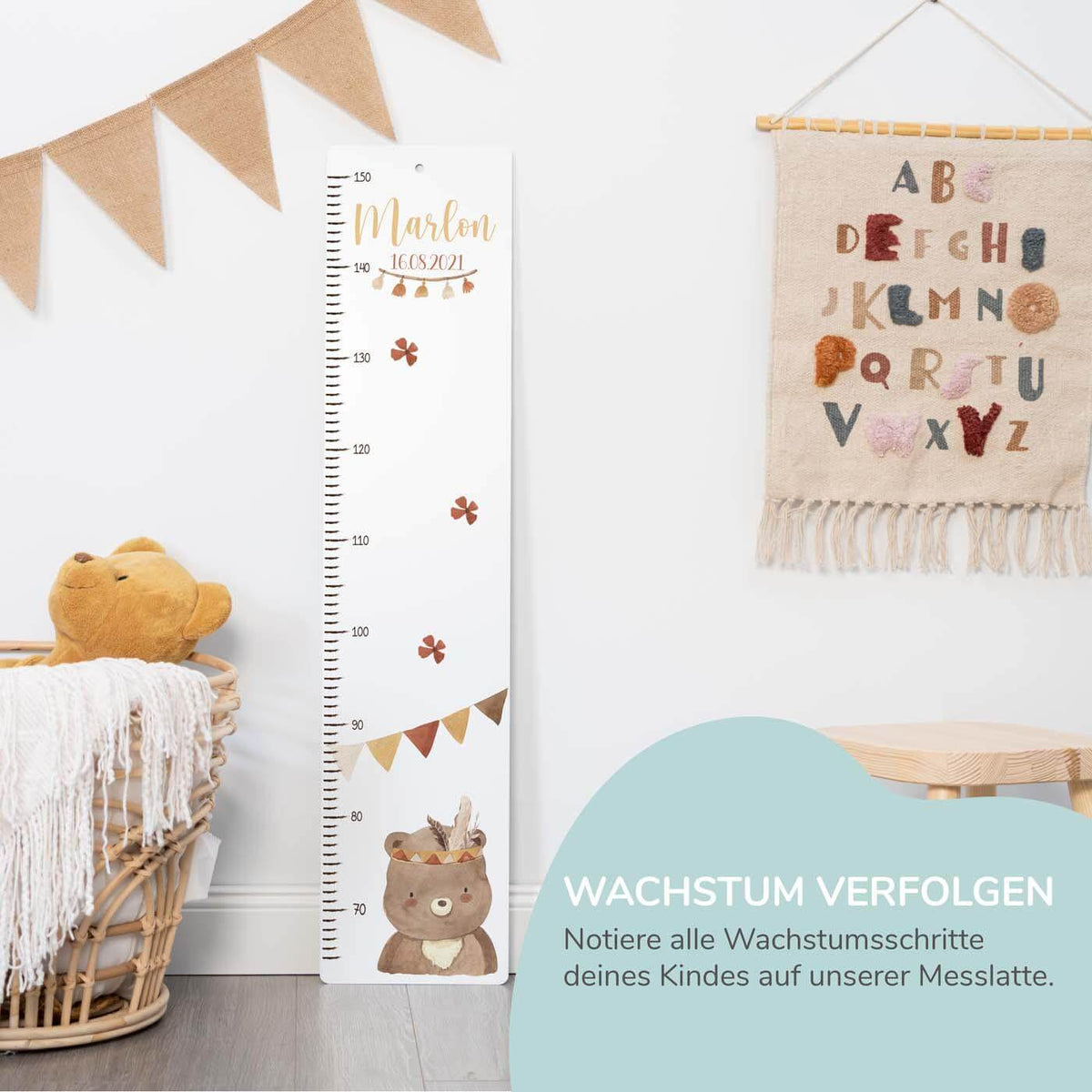 nahaufnahme der messlatte mit bär boho motiv