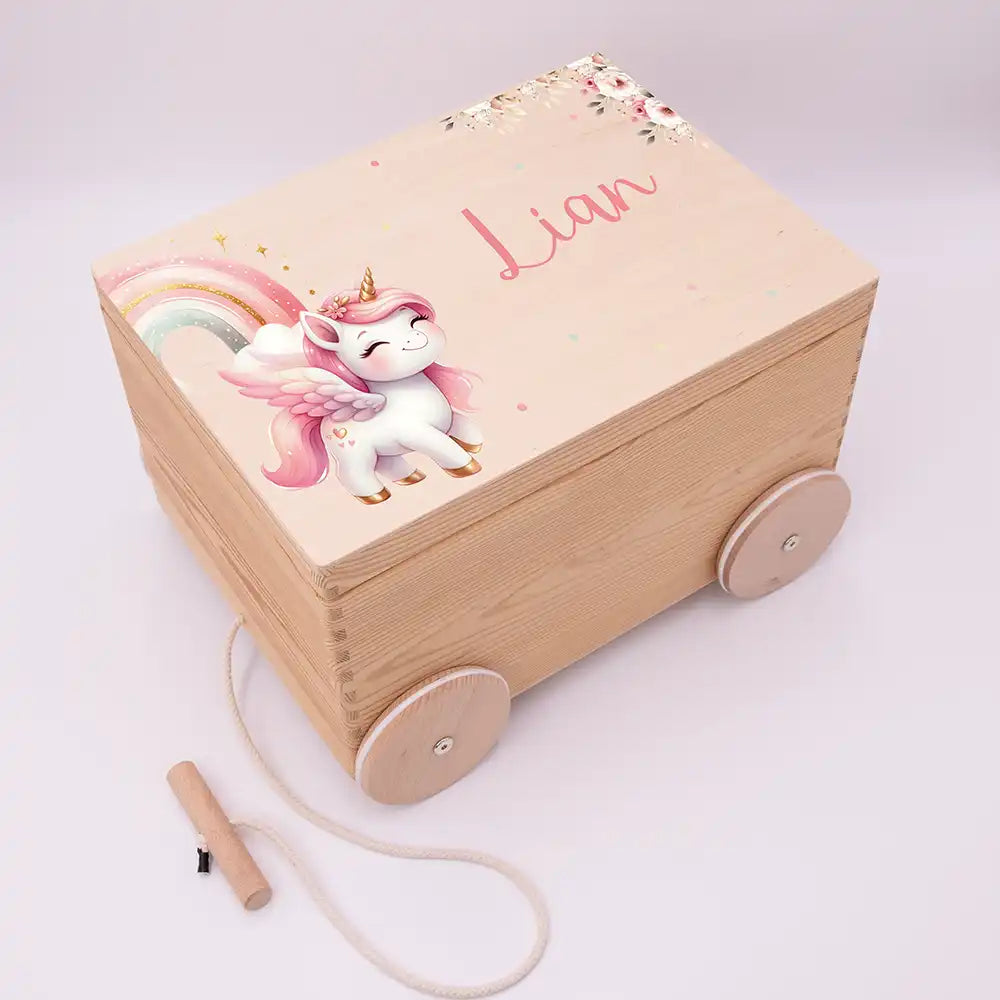 Spielzeugkiste mit Rädern personalisiert - Einhorn