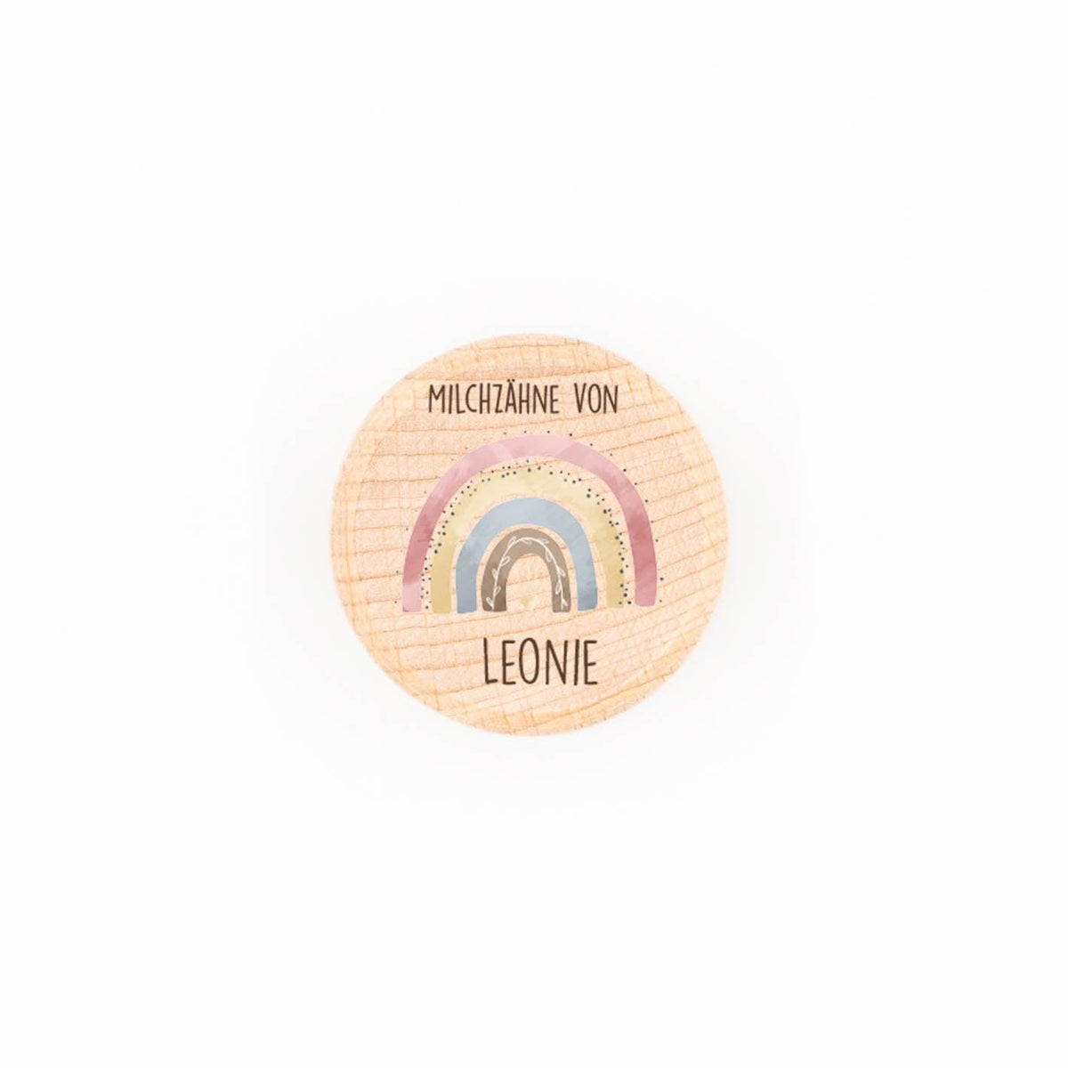 Personalized wooden milk tooth box featuring a rainbow design and name Leonie, perfect for storing baby teeth.